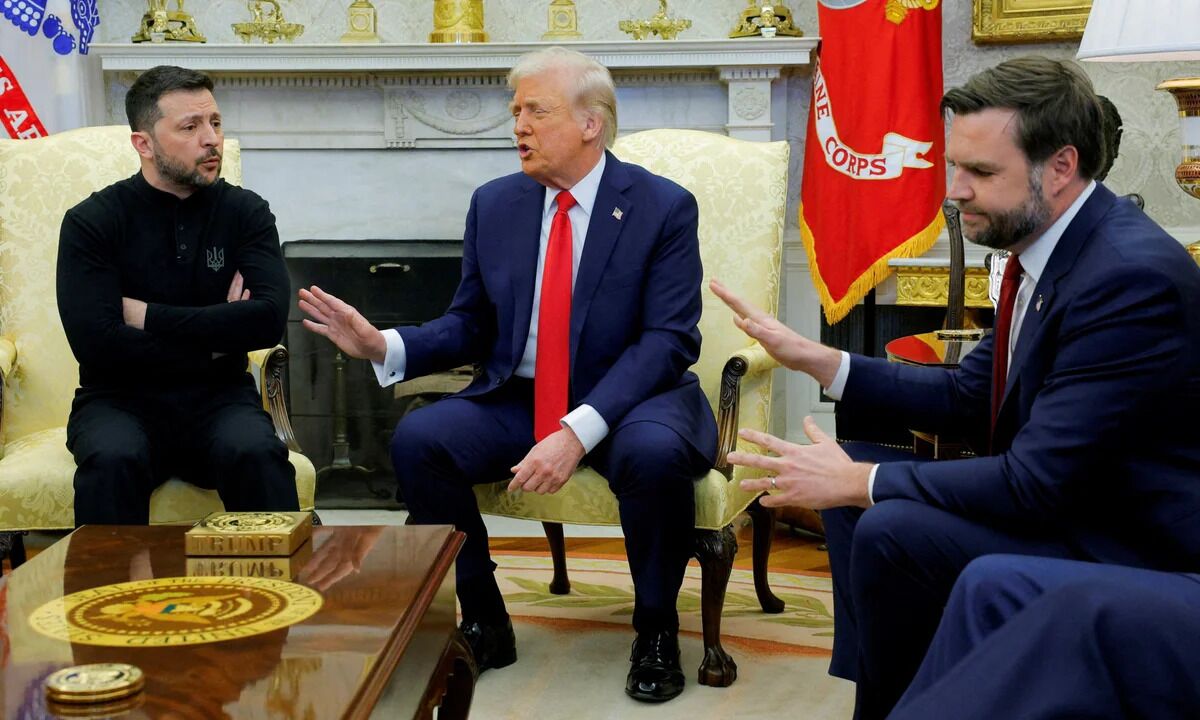 Donald Trump seated in the Oval Office during a tense political confrontation